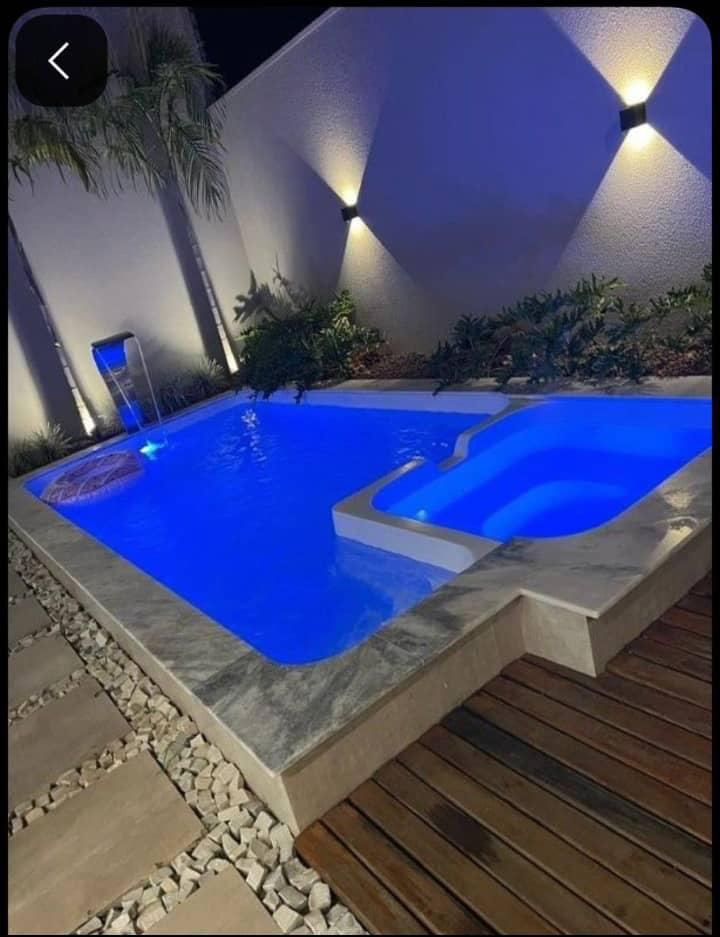 Swimming pool built by Rehoboth Water Works Ltd, lit at night